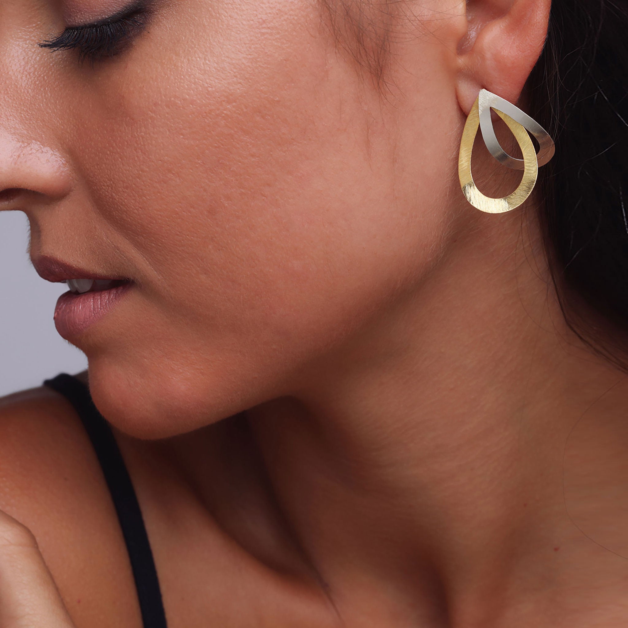 Silver and Yellow-Gold Intertwined Tear Shape Open Loop Stud Earrings